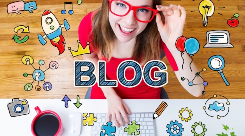 Blog concept with young woman wearing red glasses in her home office